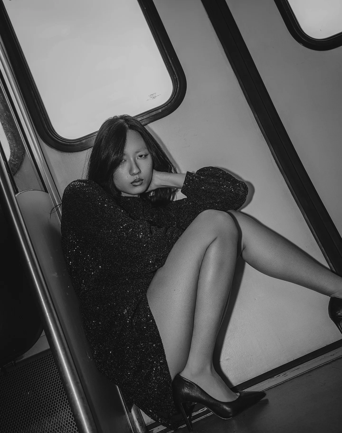 Urban fashion portrait of Sara with SkyTrain backdrop