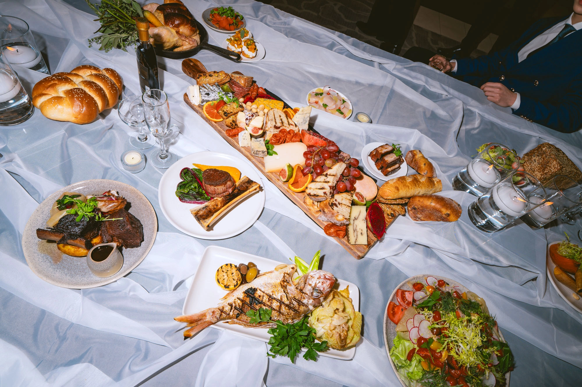 Close-up of plated food and drinks from the Arras Vancouver campaign