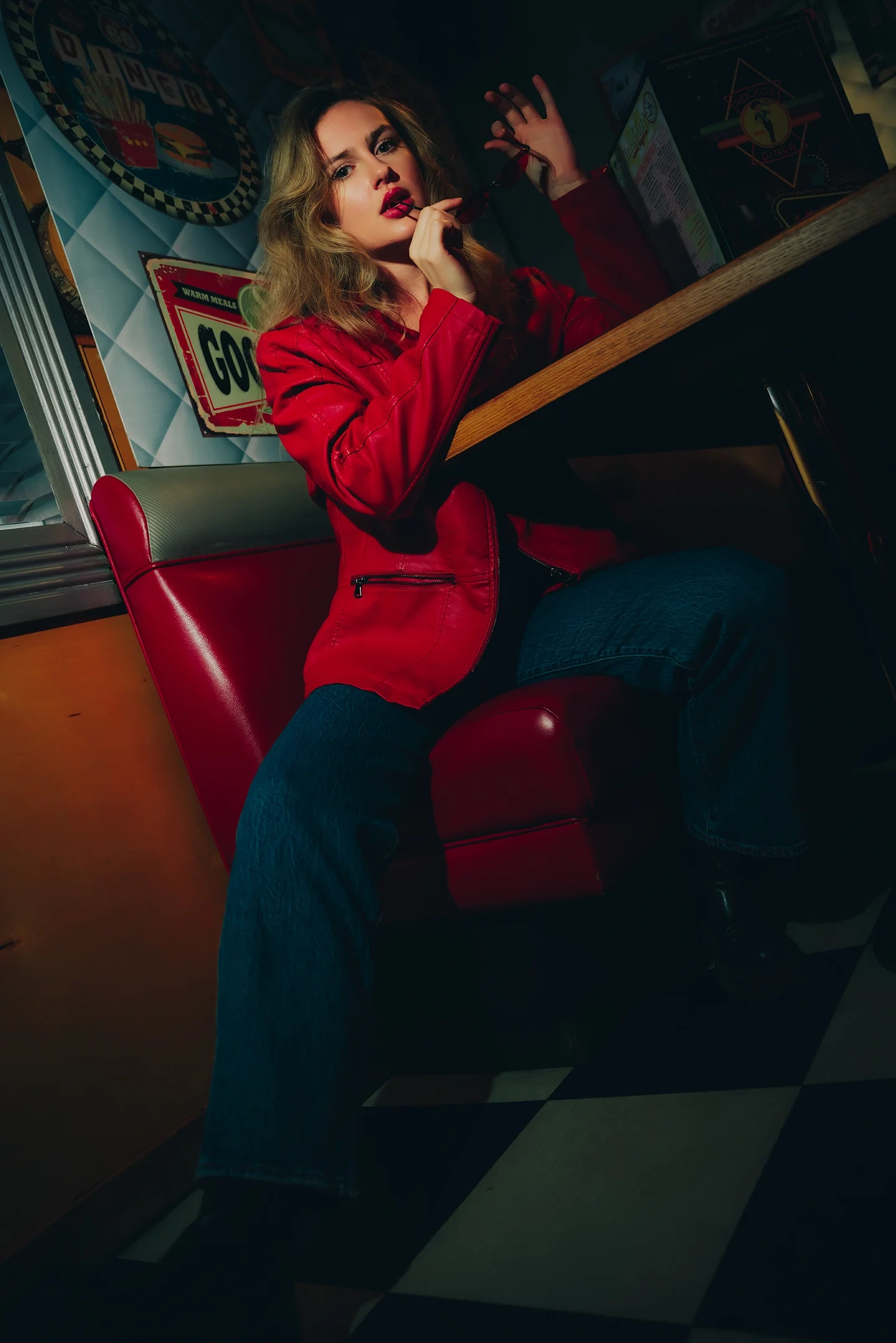 Lizzie editorial cover portrait in a diner setting