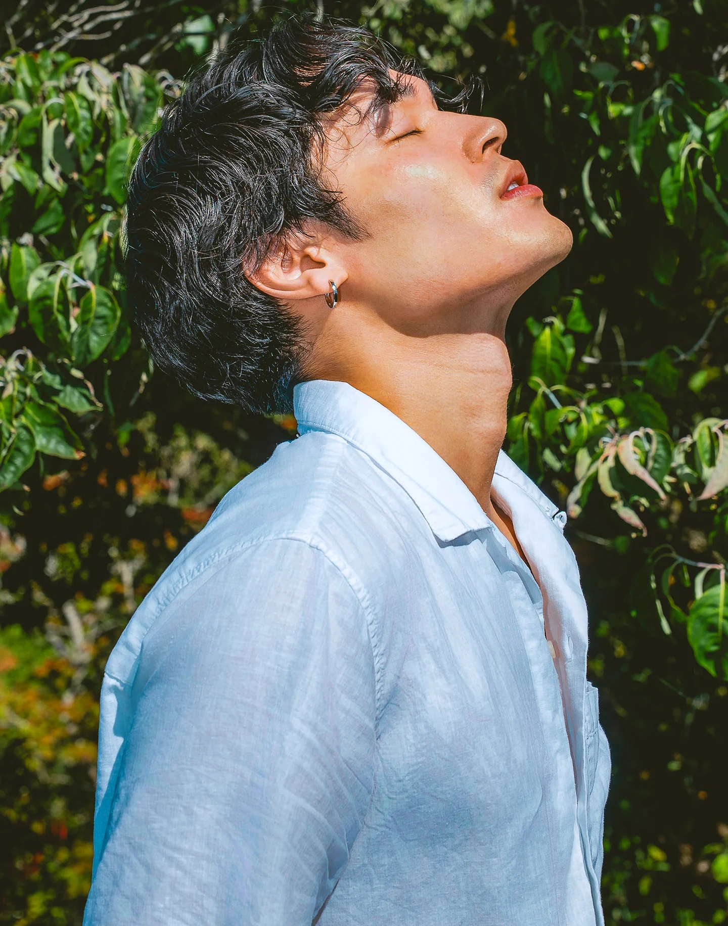 Fashion portrait of model Koki in natural sunlight outdoors