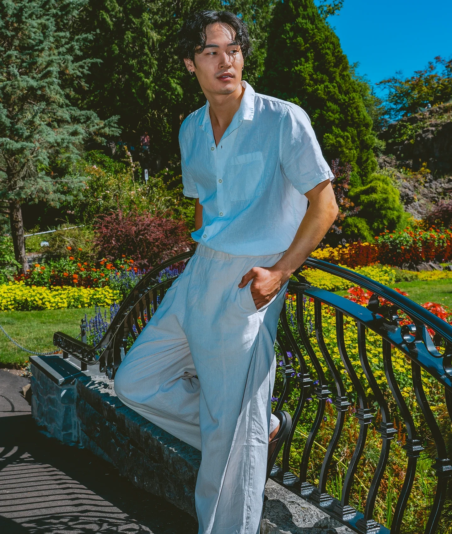 Koki editorial portrait with trees in the background